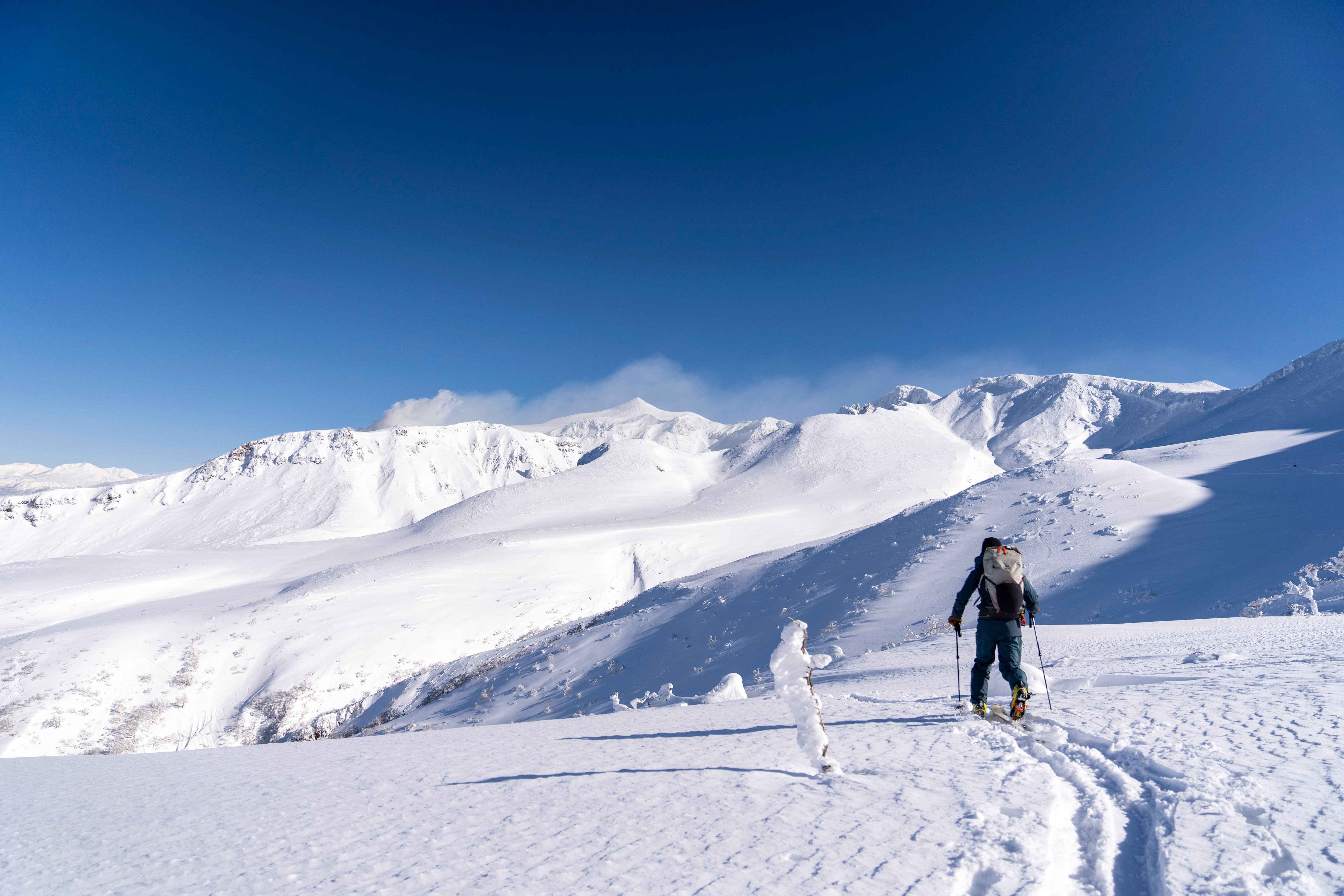 Snow-dusted Japan mountains — winter ski and onsen